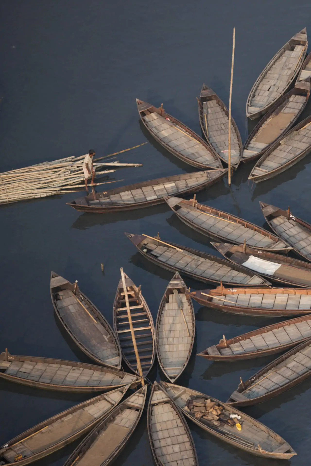 Restored traditional wooden sailing craft on the Brahmaputra river.